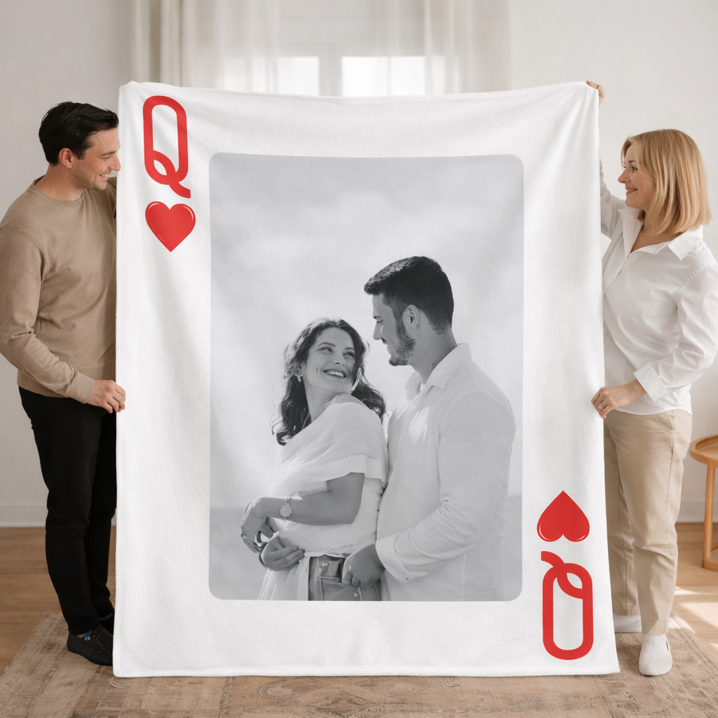 Two people holding a large photo frame with a couple inside, featuring red hearts on the sides.