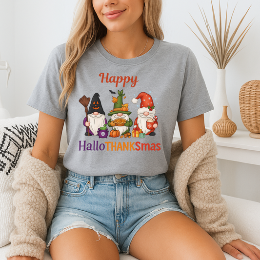 Person wearing a 'Happy HalloTHANKSmas' t-shirt with cartoon gnomes and pumpkins.